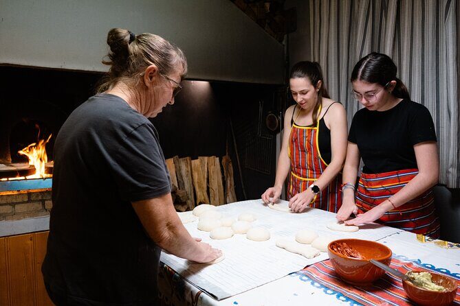 Hands-On Bolo do Caco Baking Class with a Madeiran Family - The Tasting Table: Garlic Butter, Portuguese Cheese, and Chouriço