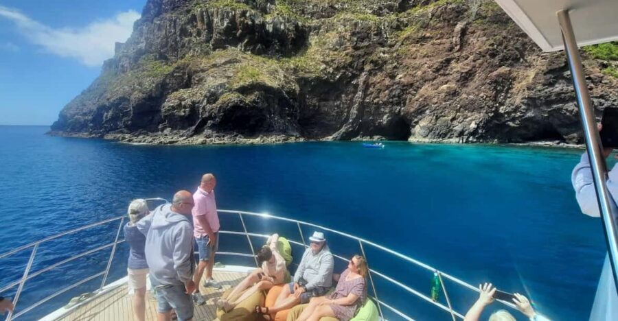 Madeira: Boat Trip with Lunch, Drinks, and Hotel Transfer - Dolphin watching and coastal views along Madeira’s south shore