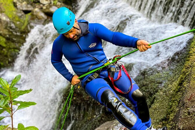 Madeira Canyoning Intermediate - The snack break and the 35-foot waterfall finish that resets the energy