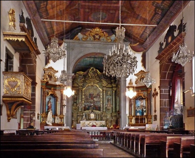 Madeira: Monte Sightseeing Tour & Toboggan Sled Ride - Church of Monte: The Tomb That Adds Real Weight to the Hills