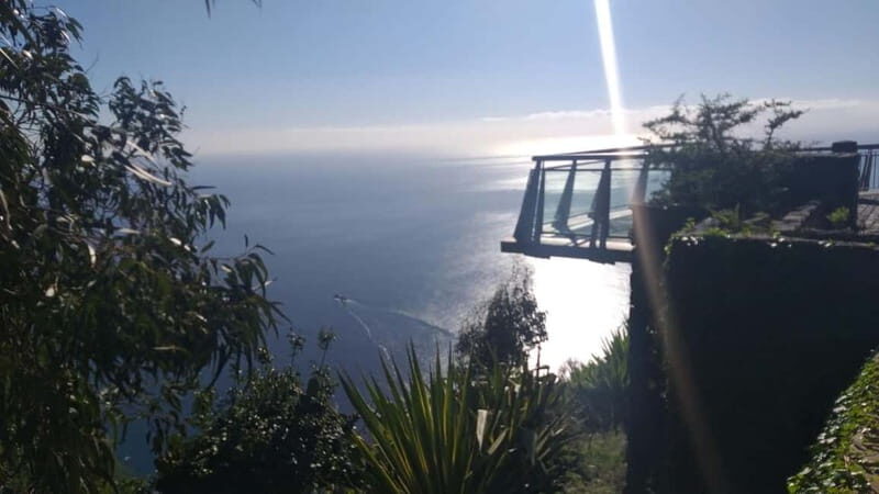 Madeira West Island Full-Day Tour with Fanal Forest - Seixal waterfalls and the coastal road back toward Funchal