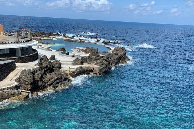 Porto Moniz, Seixal, Fanal Forest, Cliff Skywalk in Open Roof 4X4 - Praia do Seixal black sand beach: the payoff after the cliff and forest