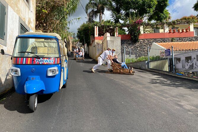 Private Express Tuk Tuk Tour Funchal Old Town & Toboggans - The toboggan run in Monte: downhill fun with a few real-world notes