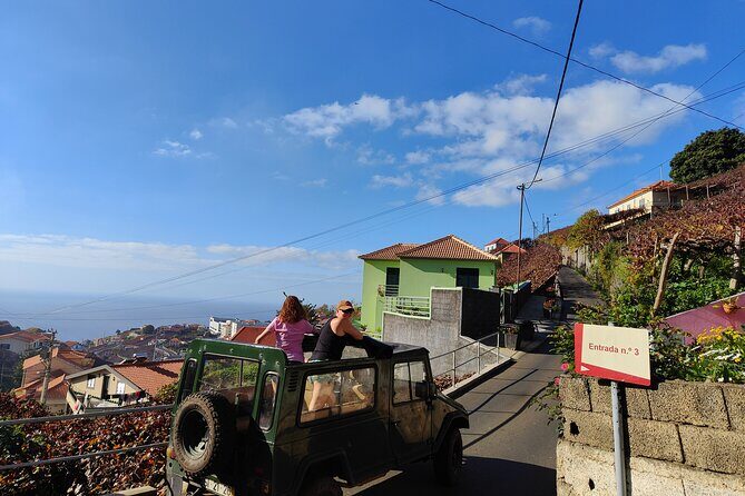 Real Life, Mountains & Sea Cliffs + Lunch + Levada walk - 6 hours - Riding Through Funchal: Barreiros Stadium and Photo Stops Close to Home